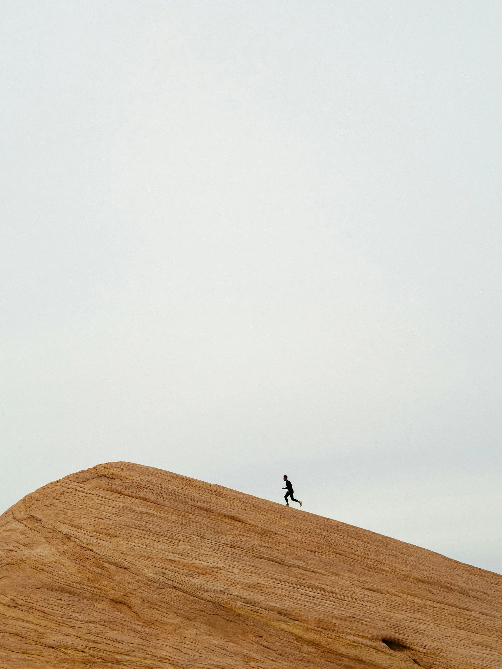 A runner on a hilltop