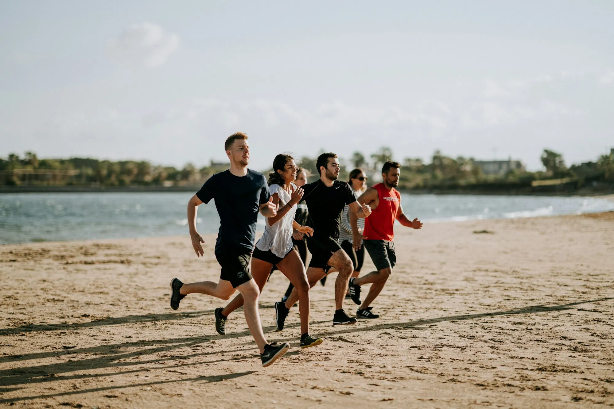 A group run along a shore