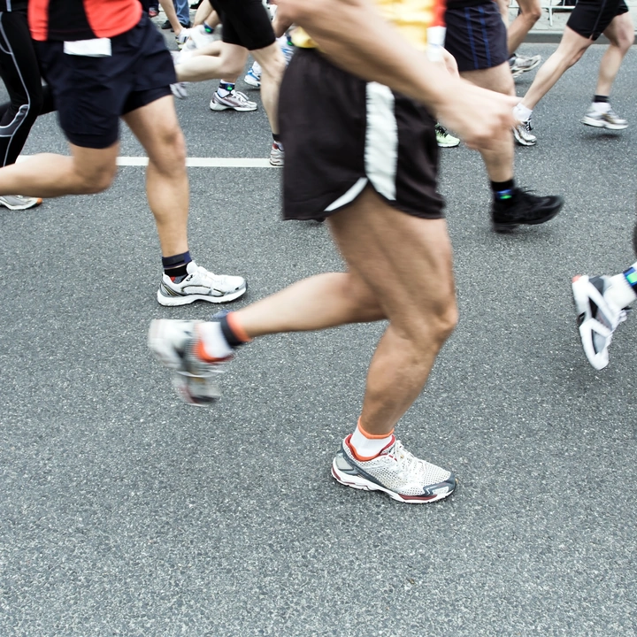Marathon runners racing on a city road